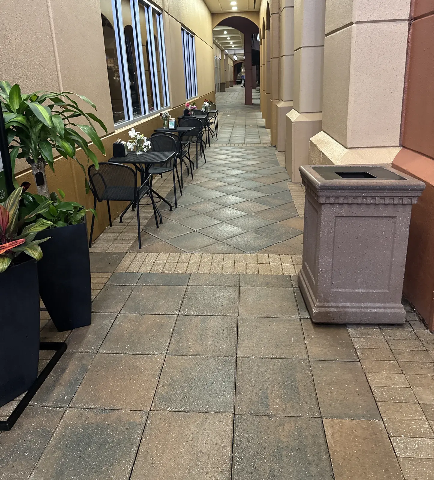 Tile walkway at a retail plaza after surface cleaning, Aventura